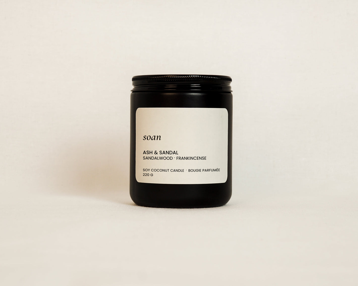 Black matte jar soy candle Ash and Sandal scent with warm sandalwood and soft frankincesne fragrance, wooden wick candle by Soan