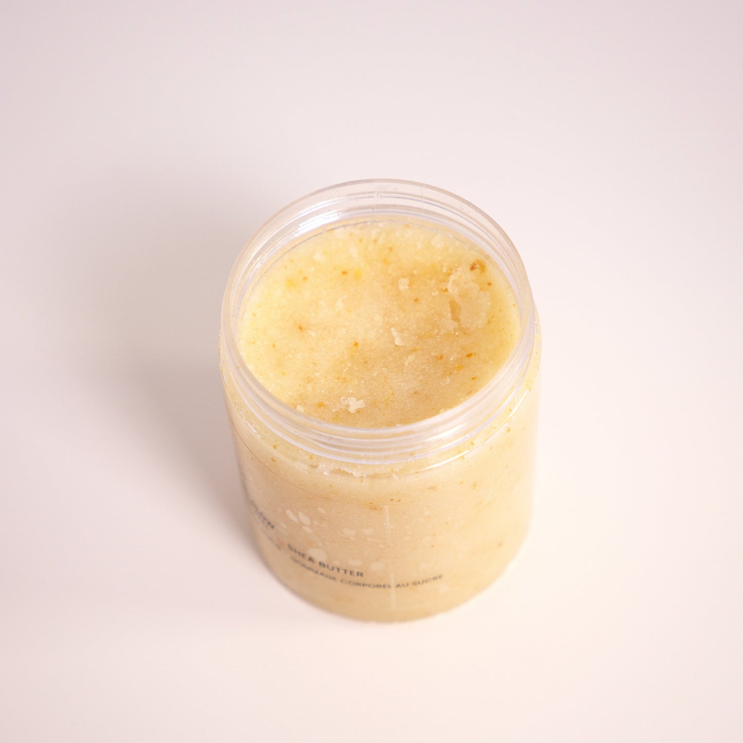 Jar of Citrus Glow Sugar Body Polish on a white background