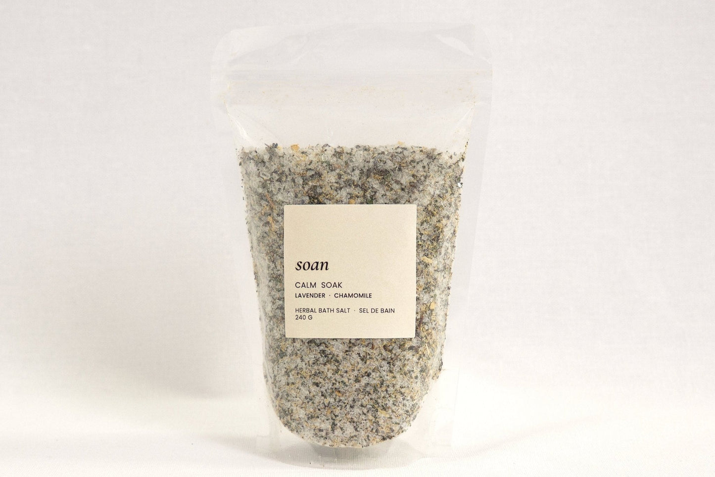 Calm Soak bath salt blend with lavender and chamomile, crafted to ease stress and promote restful relaxation