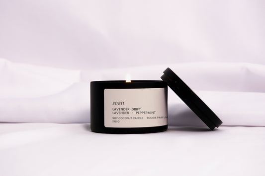 Lavender Drift tin candle in black matte jar with cotton wick, hand-poured and scented with calming lavender and mint