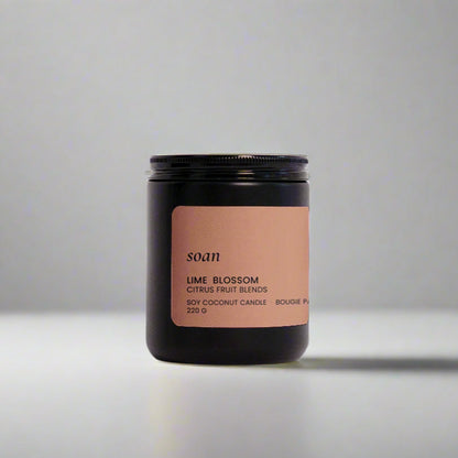 Candle jar with a label on a white background