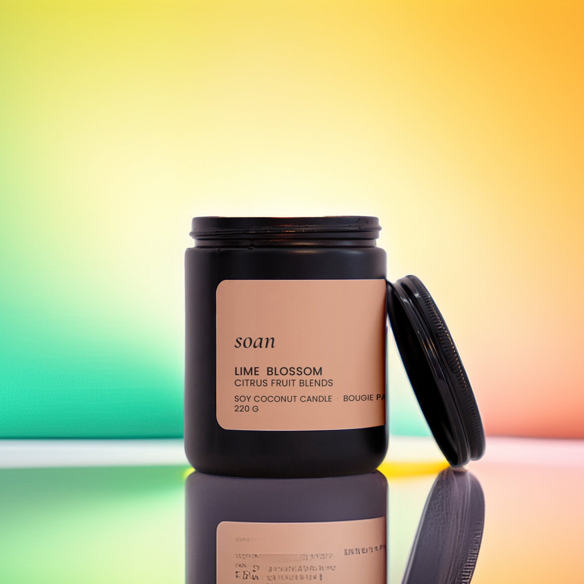 Candle jar with lid on a gradient background