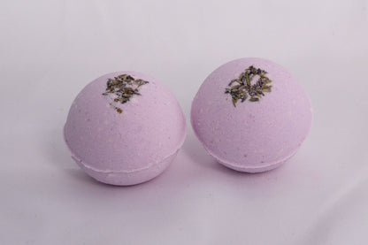 Lavender bath bomb with natural texture, hand-pressed and infused with relaxing aromatherapy bath