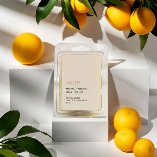 Sculpted wax bar with 'Sculpt' branding surrounded by lemons and leaves on a white background