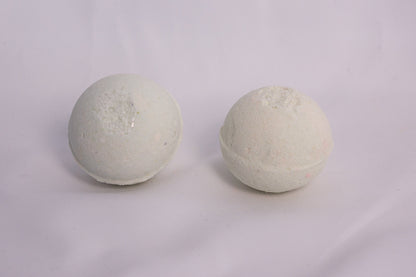 Bath bomb styled with pine and moss elements, evoking the scent of a tranquil forest soak