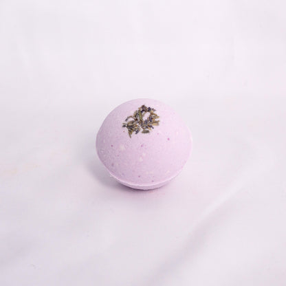 Lavender bath bomb with natural texture, hand-pressed and infused with relaxing aromatherapy bath