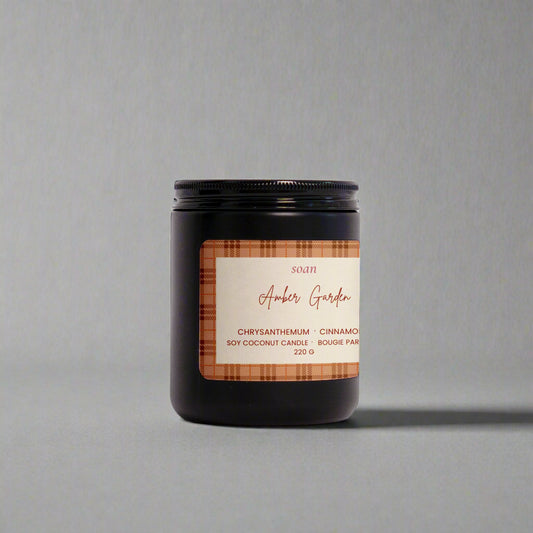 Candle with a label on a white background