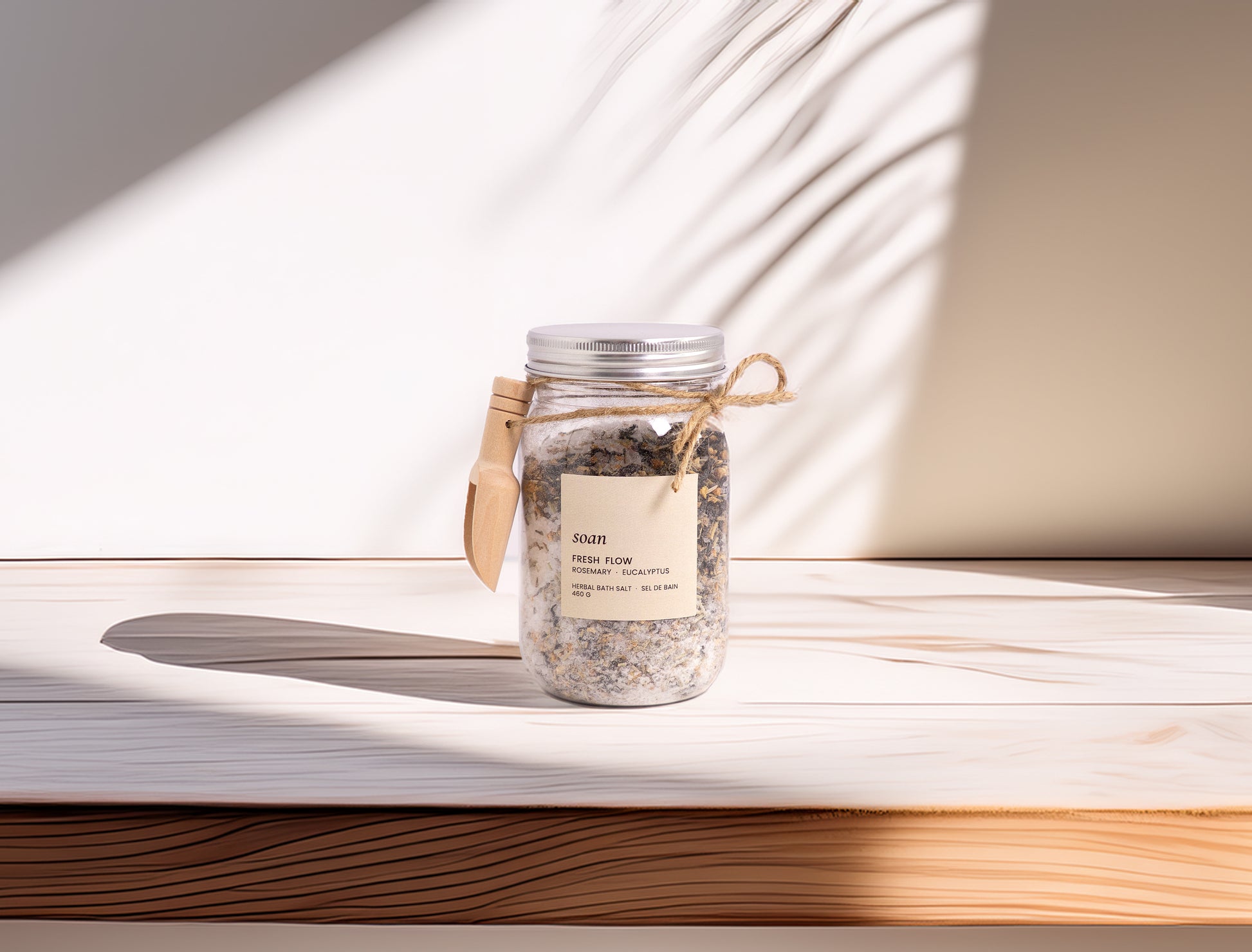 Jar of bath salts on a wooden surface with soft lighting