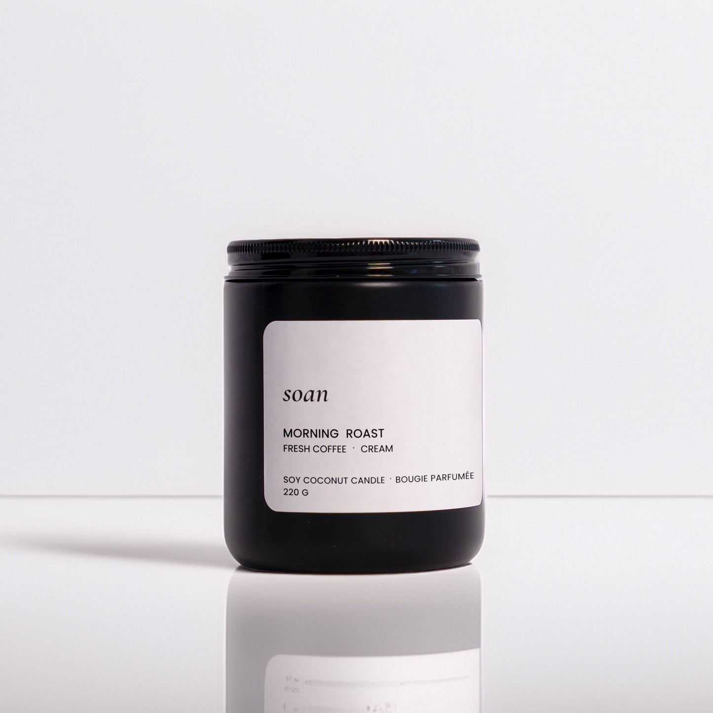 Candle labeled 'SOAN' with 'Morning Roast' on a white background