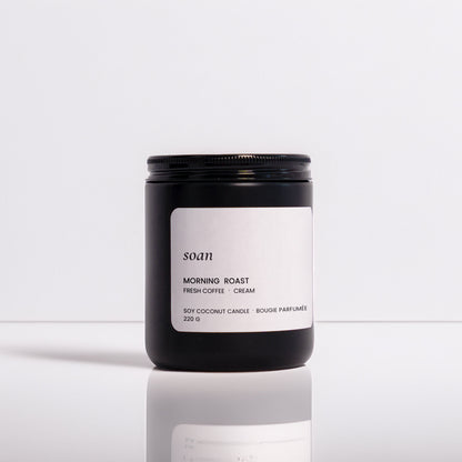 Candle labeled 'SOAN' with 'Morning Roast' on a white background