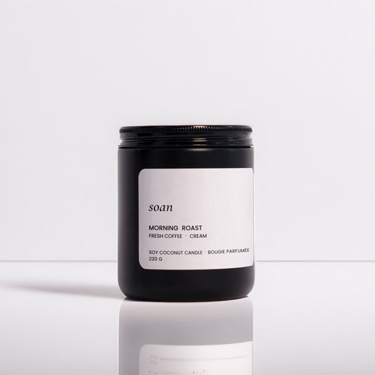 Candle labeled 'SOAN' with 'Morning Roast' on a white background