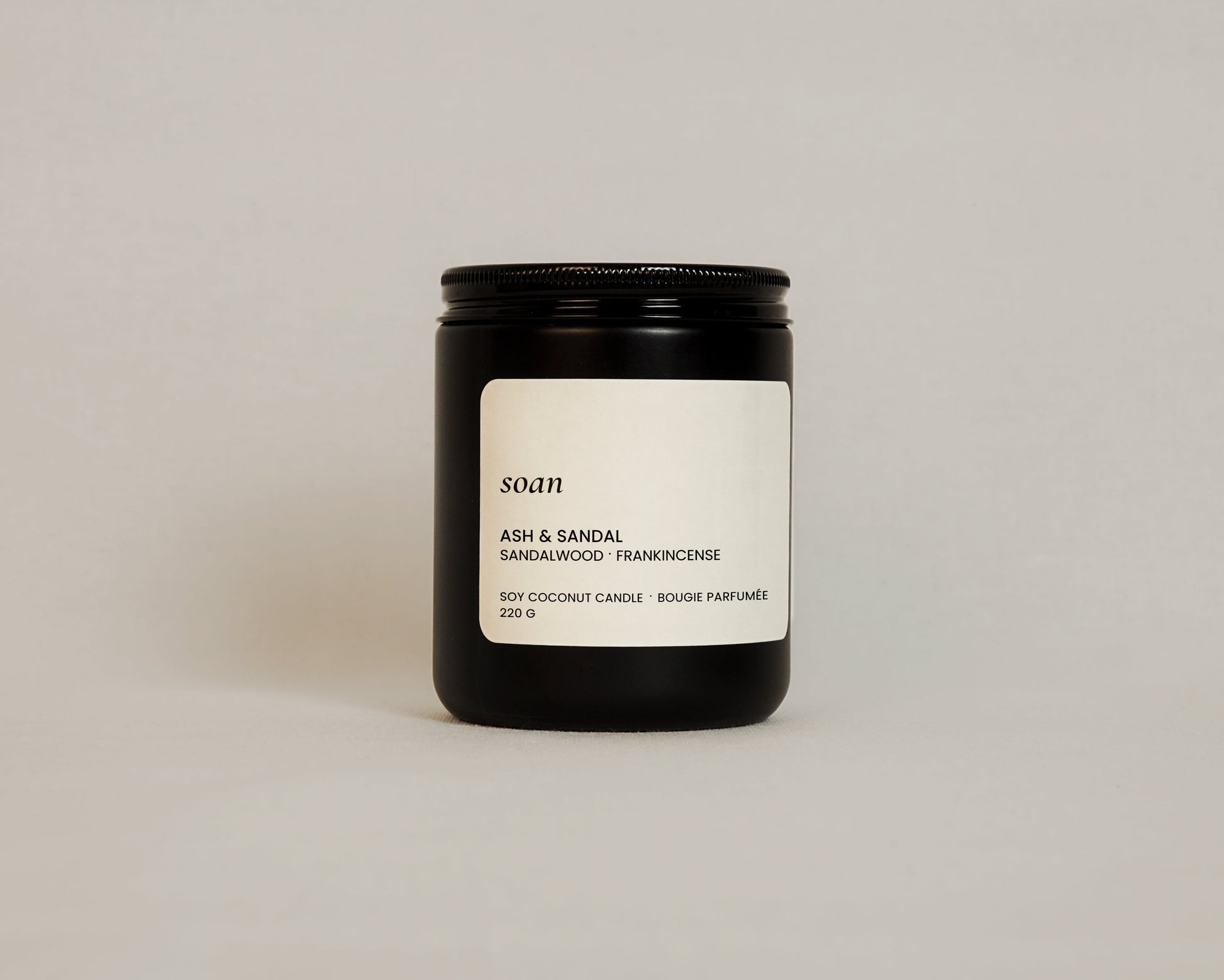Black matte jar soy coconut candle Ash and sandal scent with warm sandalwood and soft frankincense fragrance, wooden wick candle by Soan