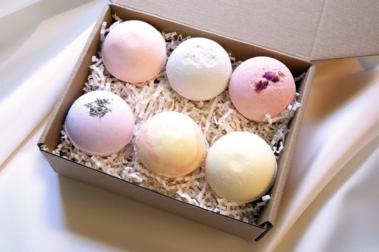 Set of six bubble bath bombs in assorted scents, hand-pressed and packaged for a soothing self-care gift
