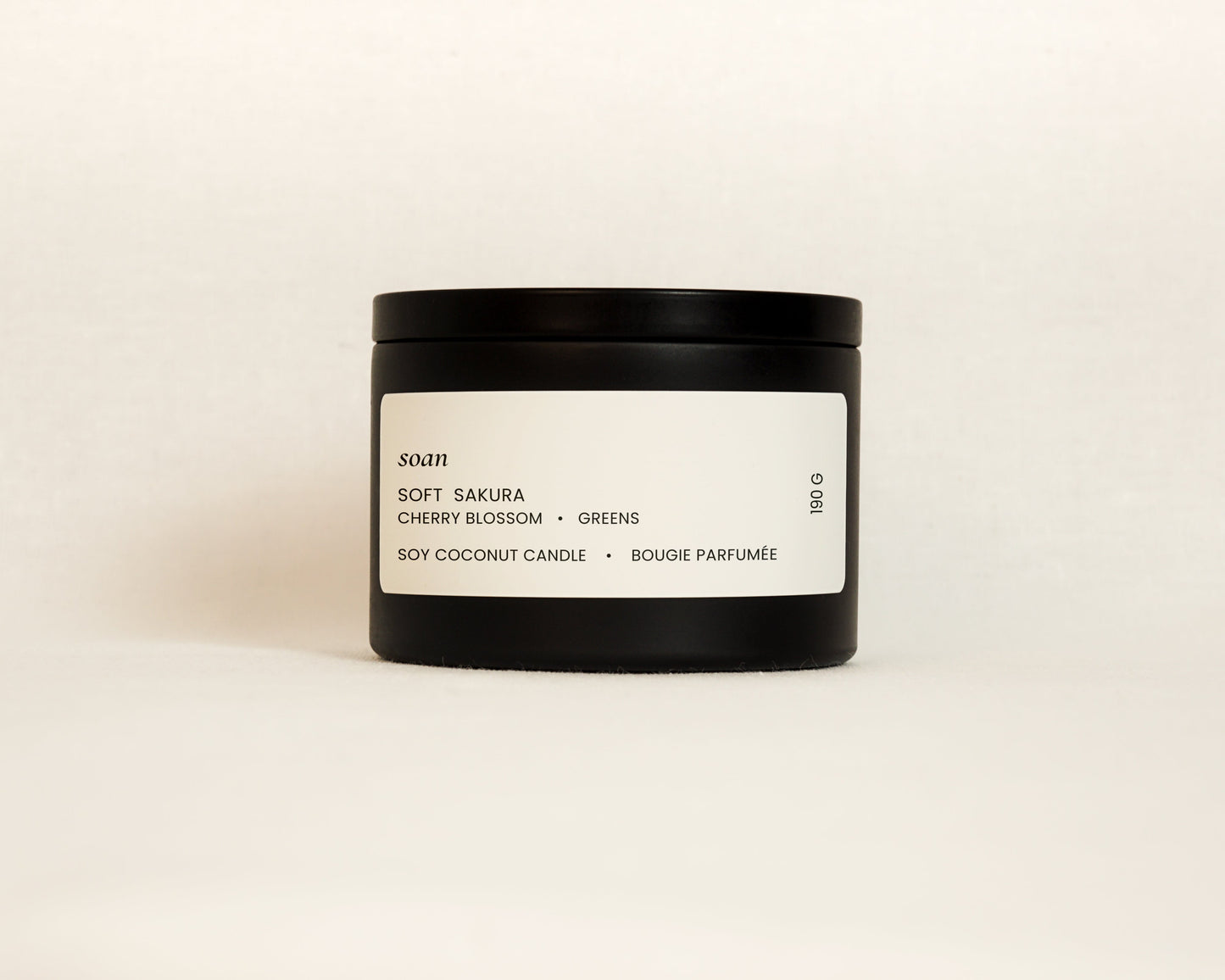 Soft Sakura cherry blossom soy coconut candle in black tin with cotton wick and floral cherry blossoms scent spring fragrance by Soan