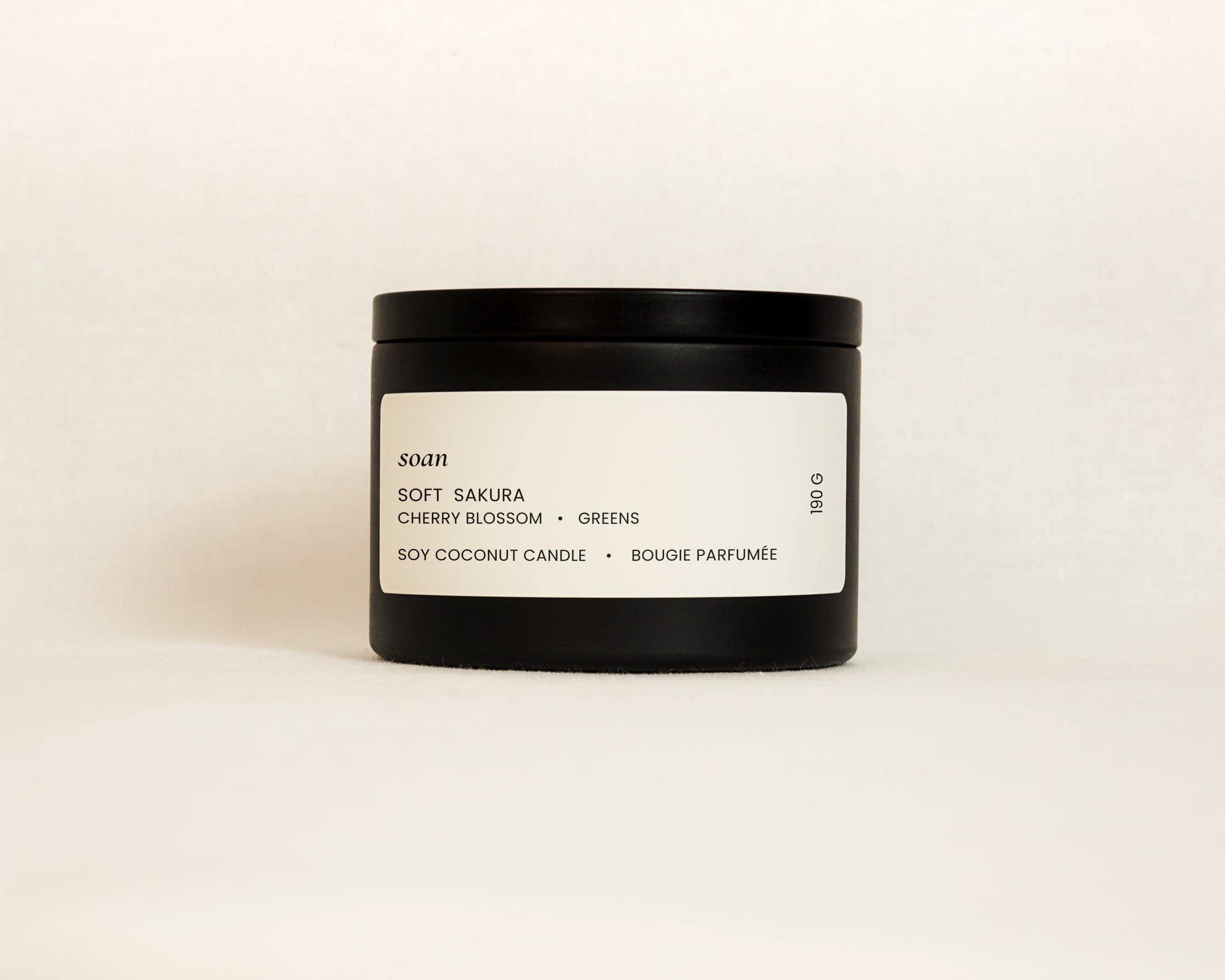 Soft Sakura cherry blossom soy coconut candle in black tin with cotton wick and floral cherry blossoms scent spring fragrance by Soan
